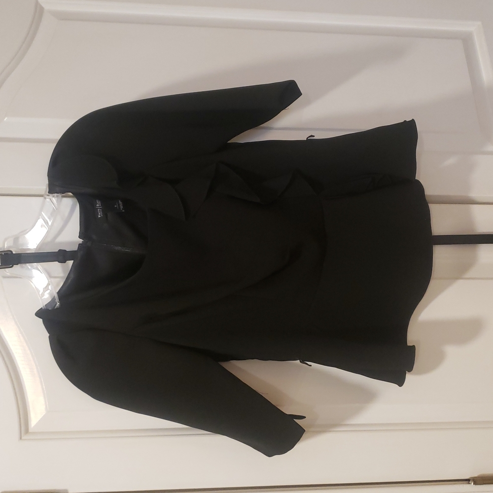 EUC White House Black Market Black Peplum top with ruffle detail and belt.